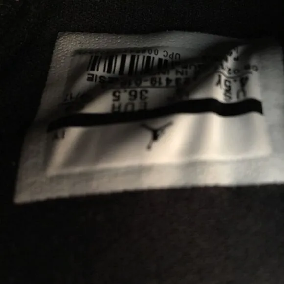 Jordan’s Big kids 4.5 Black Teddy Bear Fur Logo