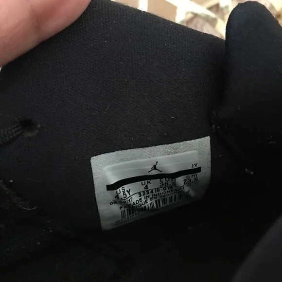 Jordan’s Big kids 4.5 Black Teddy Bear Fur Logo